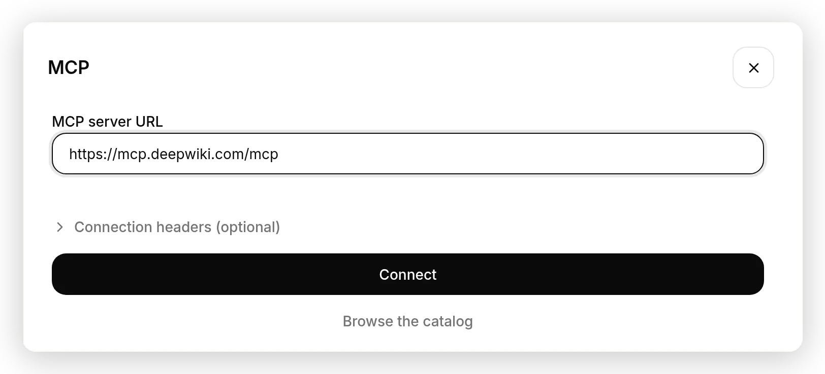 Manual entry: the MCP server URL field and optional connection headers